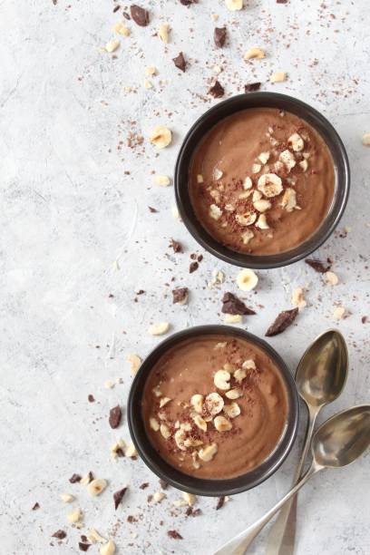 istock Chocolate smoothie with banana and nuts. Protein smoothie. 1203825473