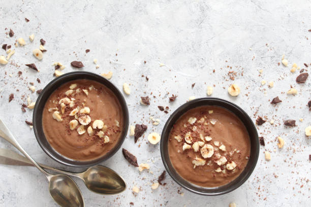istock Chocolate smoothie with banana and nuts. Protein smoothie. 1203825545
