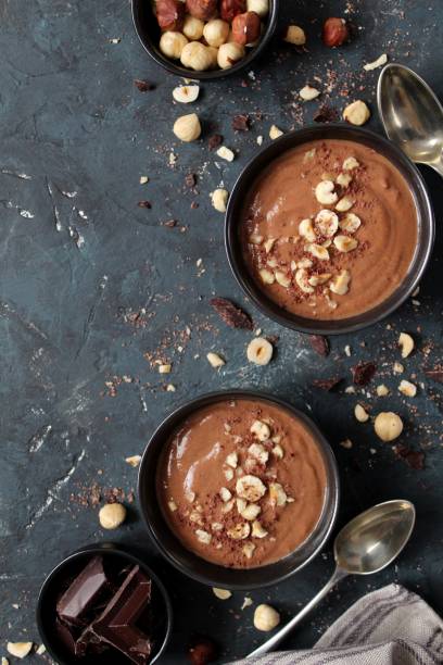 istock Chocolate smoothie with banana and nuts. Protein smoothie. 1203825647