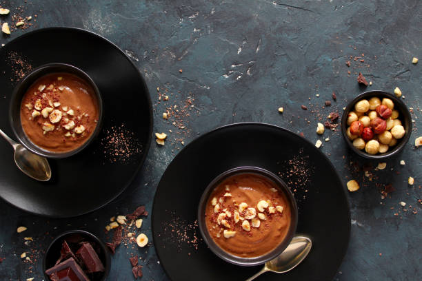 istock Chocolate smoothie with banana and nuts. Protein smoothie. 1203825668