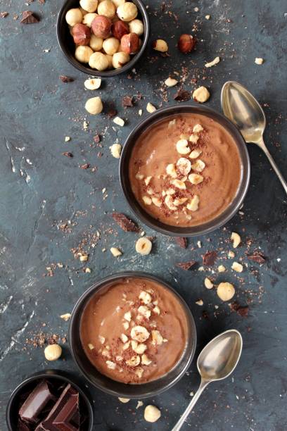 istock Chocolate smoothie with banana and nuts. Protein smoothie. 1203825718
