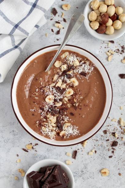 istock Chocolate smoothie with banana and nuts. Protein smoothie. 1203826592