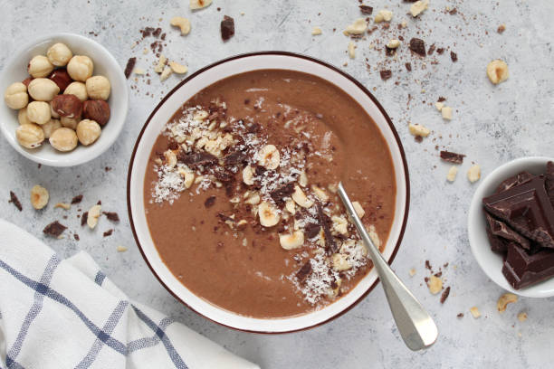 istock Chocolate smoothie with banana and nuts. Protein smoothie. 1203826605