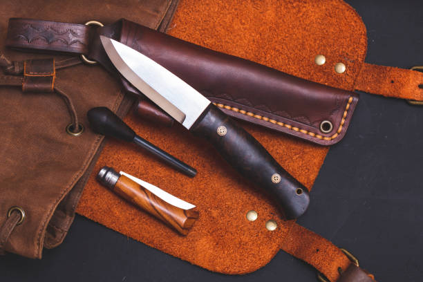 istock bushcraft knife and other equipment 1203826836