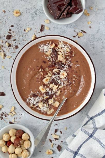 istock Chocolate smoothie with banana and nuts. Protein smoothie. 1203826877