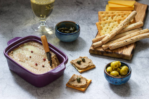 chicken liver, onion and carrot paste, served with crackers, grissini, olives, capers and champagne. - italian cuisine wine food pasta imagens e fotografias de stock