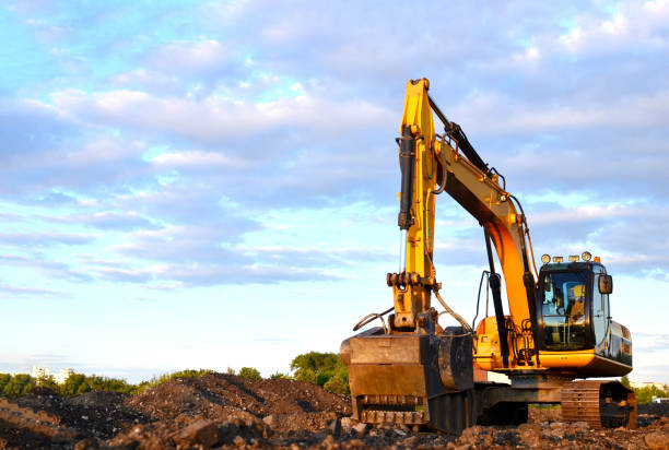 istock Excavator with crusher bucket for crushing concrete 1203830123