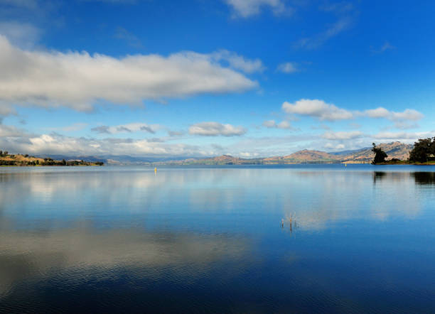 Beautiful Reflections On Lake Hume NSW Australia Beautiful Reflections On Lake Hume A Sunny Autumn Day With A Few Clouds lake murray stock pictures, royalty-free photos & images