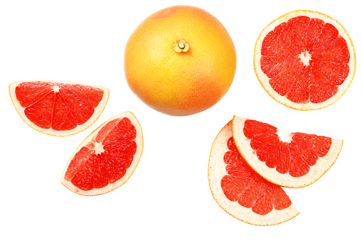 healthy food. grapefruit with slices isolated on white background top view
