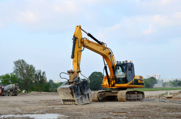 istock Excavator with crusher bucket for crushing concrete. 1203836694