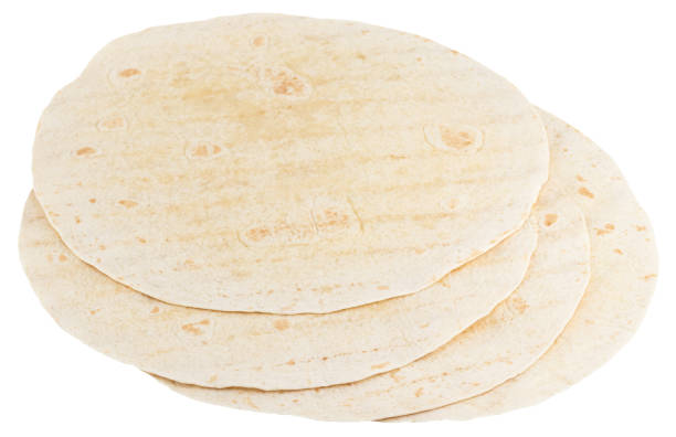 istock Corn tortillas isolated on white background. Unleavened bread 1203839495