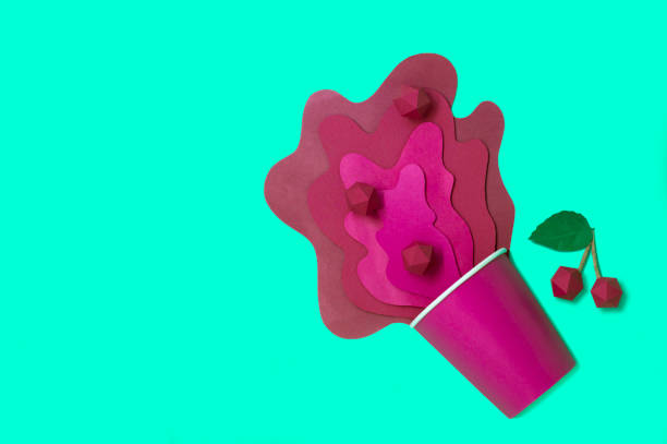 istock Paper cup with spilled cherry juice 1203840769