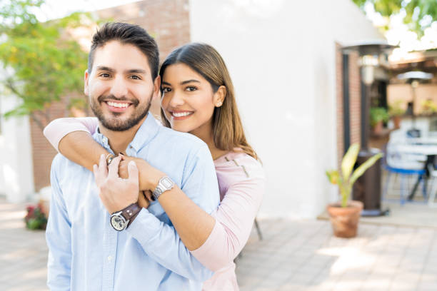 istock Smiling Couple Dating At Cafe 1203840889