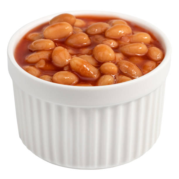 istock white beans in tomato sauce isolated on white background 1203844015