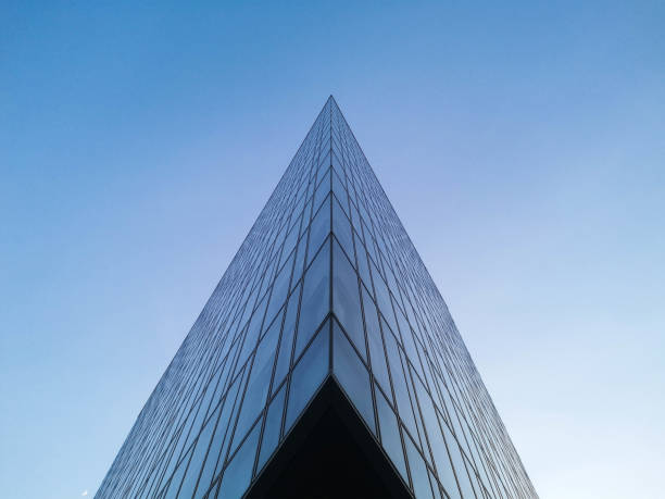 istock Green Point Offices Bratislava - low angle view of an office building with a pattern and a triangular shape 1203845604
