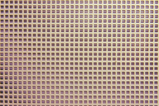 istock Background of metal barrage lattice from square sections, closeup 1203846422