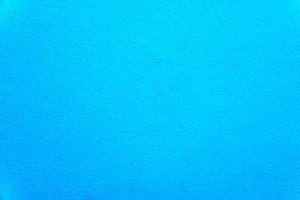 istock Texture of an uneven wall with rough edges, blue background close-up 1203846469