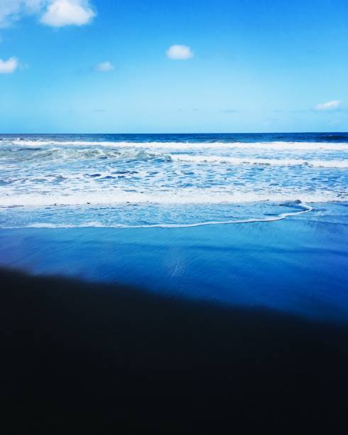 istock Black Sand Beach — Deep in Waipi’o Valley, Hawai’i 1203848563