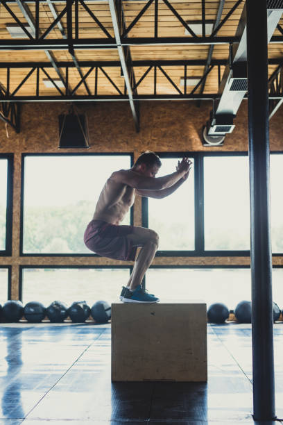 istock Athlete Jumping on a Plyo Box 1203851889