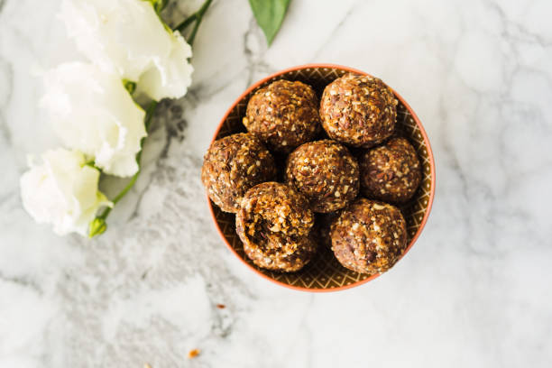 istock Energy balls with healthy ingredients on marble 1203853657