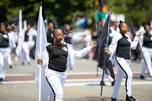 Chicago, Illinois, USA - August 8, 2019: The Bud Billiken Parade, Members of the South Shore Drill Team performing at the parade