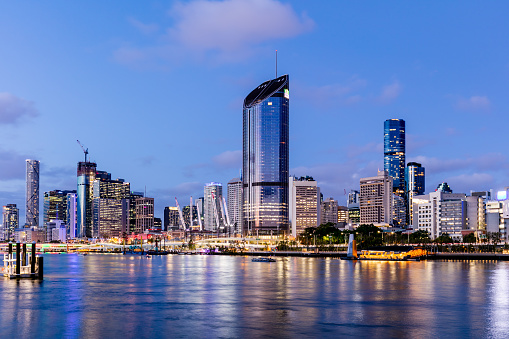 View along Brisbane River of city skyline at dusk.\n\nBrisbane is the state capital and the most populated city in the Australian state of Queensland.  It is also the third most populous city in Australia.
