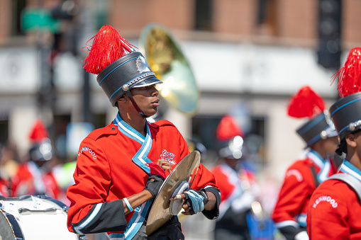 Chicago, Illinois, USA - August 8, 2019: The Bud Billiken Parade, Members of the Kenwood High School Marching Band, performing at the parade