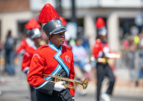 Chicago, Illinois, USA - August 8, 2019: The Bud Billiken Parade, Members of the Kenwood High School Marching Band, performing at the parade