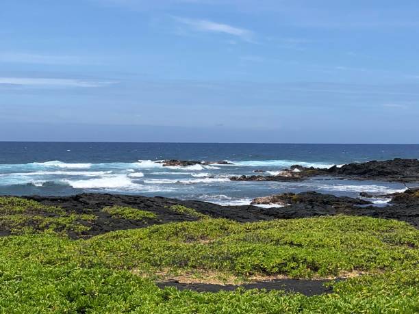 istock Hawaii island black sands beach 1203865282