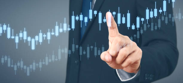 istock Businessman plan graph growth and increase of chart positive indicators 1203867860