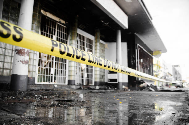 istock cordon tape across burned building 1203869718