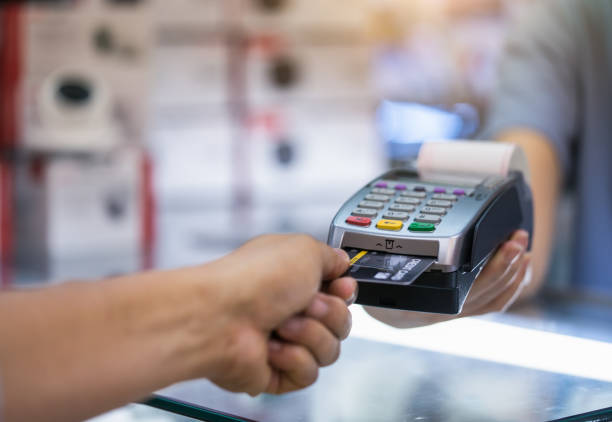 istock Credit card payment, credit card machine. 1203878875