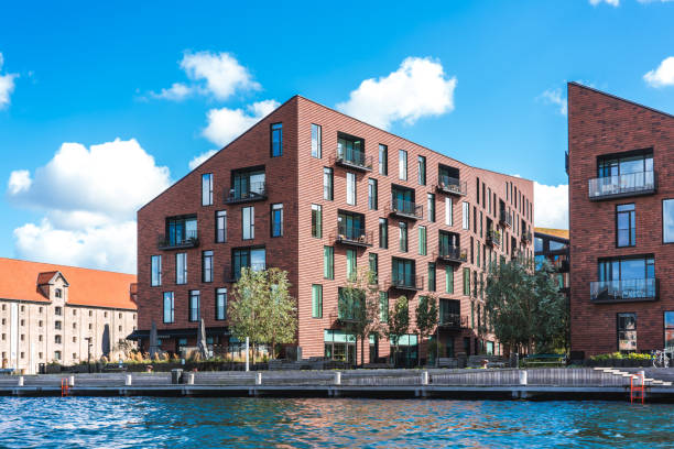 istock Apartment buildings waterfront homes panorama Copenhagen Denmark 1203880821