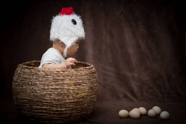 istock Baby in Costume like chick 1203881618
