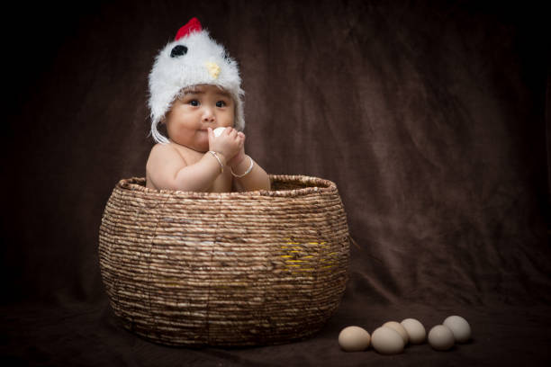 istock Baby in Costume like chick 1203881629