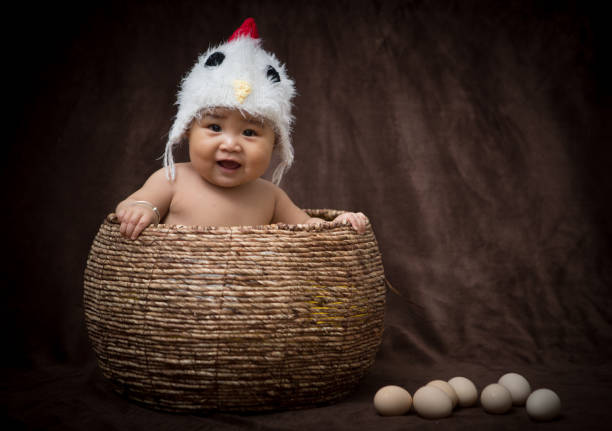 istock Baby in Costume like chick 1203881635