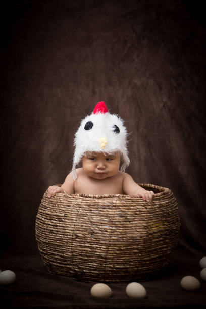 istock Baby in Costume like chick 1203881658
