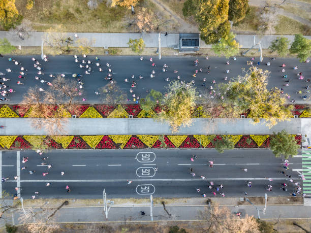 istock Runners in the street 1203886396