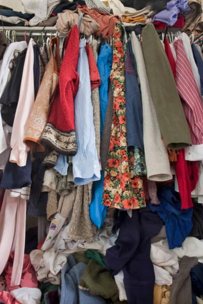 istock messy closet overfilled with clothes 1203893078