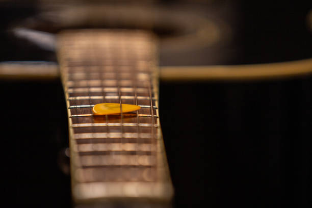 istock A pick on the guitar neck 1203893829