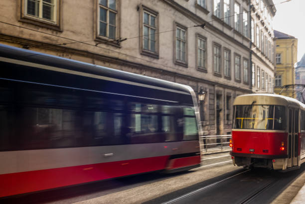 istock Modern and old trams in Prague moving during a sunny day 1203893901