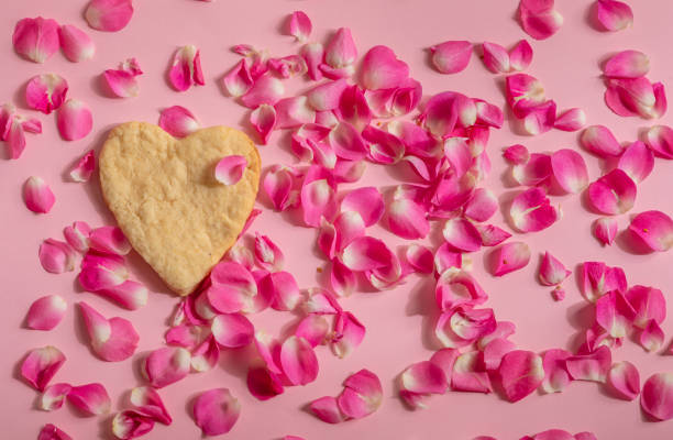 istock Heart and rose petals 1203894031
