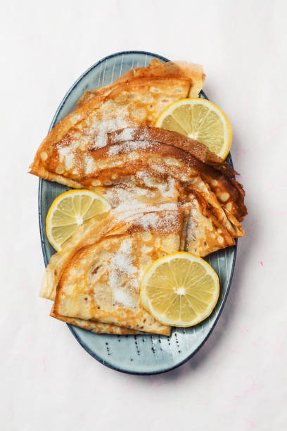 istock Shrove Tuesday pancakes with lemon 1203894176