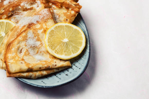 istock Shrove Tuesday pancakes with lemon 1203894199