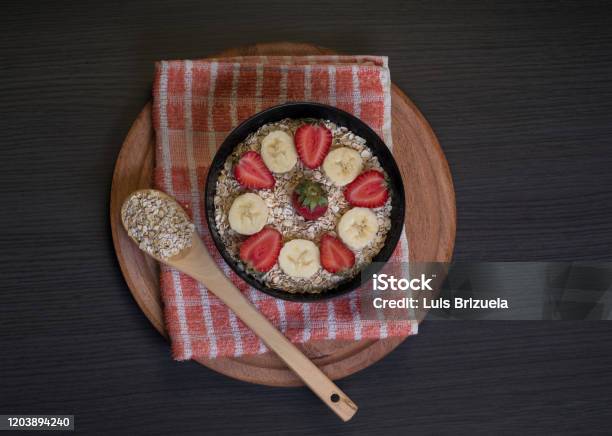 Aerial View Of Bowl With Oatmeal And Fruits Stock Photo - Download Image Now - Argentina, Banana, Blended Drink