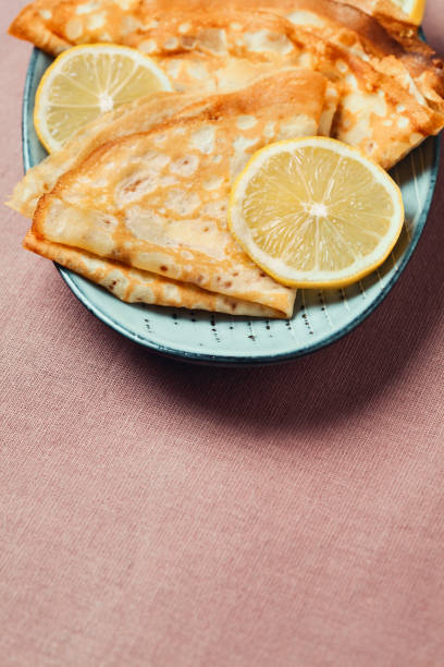 istock Shrove Tuesday pancakes with lemon 1203894286