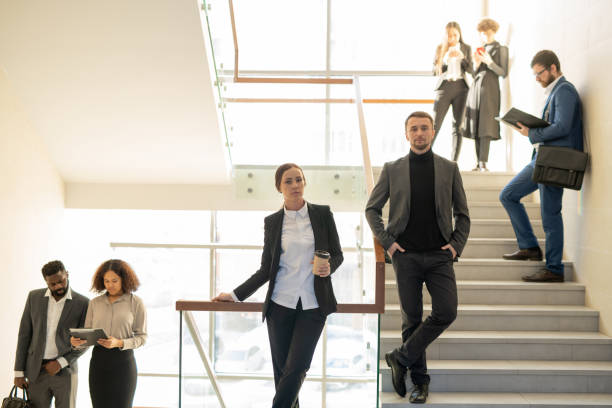 istock Business people on stairs 1203895180