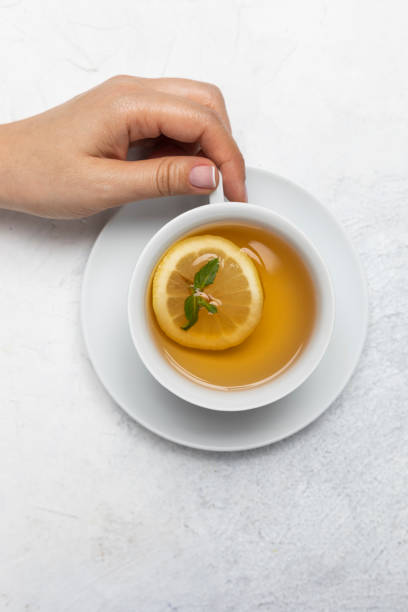 istock Woman with Herbal Tea 1203895564