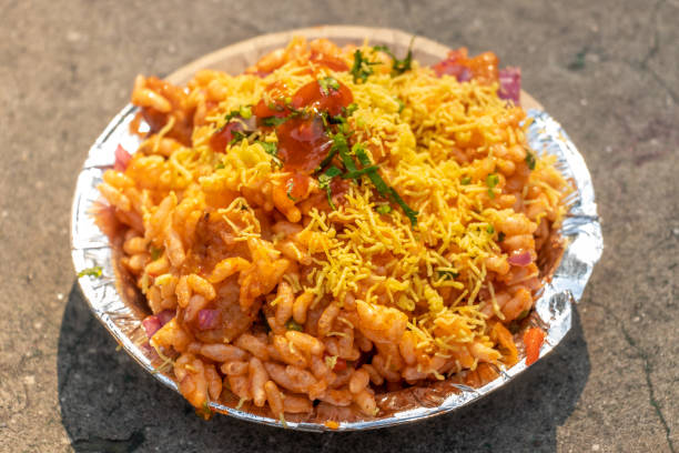 istock Bhel Puri or BhelPuri Chaat in paper bowl, selective focus 1203896083