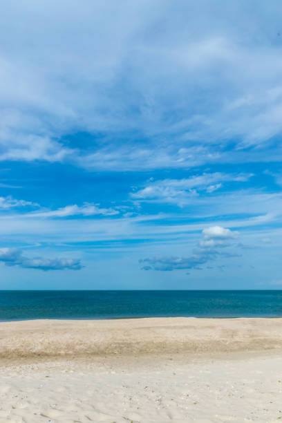 istock Nobody on the beach with blue sky and cloud 1203898787